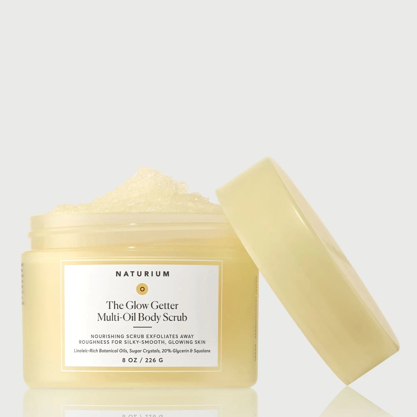 the-glow-getter-multi-oil-body-scrub-m0 NATR-40028-GlowGetter-Multi-Oil-Body-Scrub-Front-CapOff-bonebkgd.webp